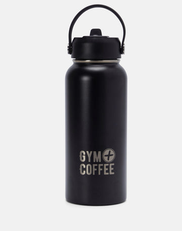 A black stainless steel water bottle with a Gym+Coffee logo, featuring a flip straw lid and carry handle.